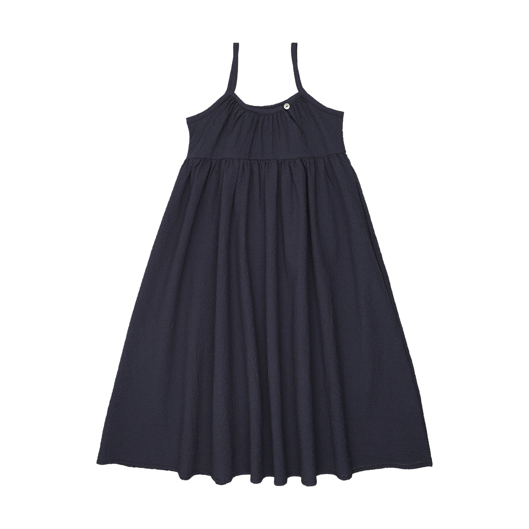 Navy blue dress with thin straps on a white background