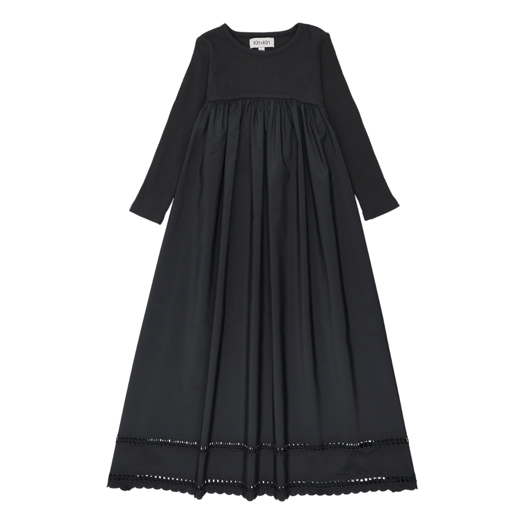 Black dress with long sleeves on a white background