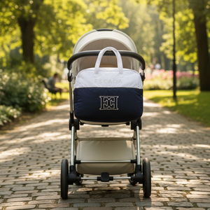 Stroller with a baby seat cover in a park setting