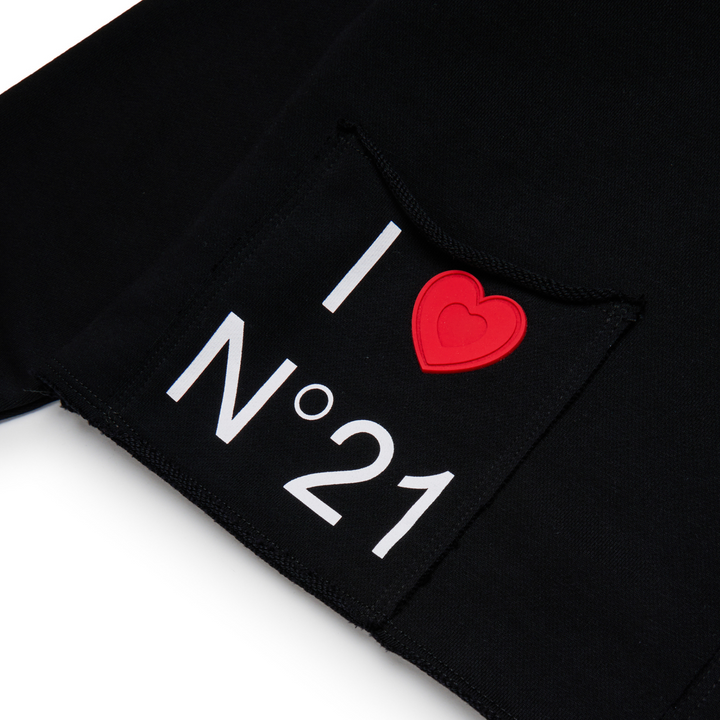 Black fabric with ❤️ N×21' text and red heart on a white background