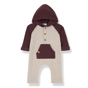 Baby romper with maroon sleeves and hood on a white background
