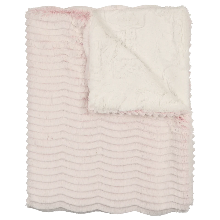 Pink textured blanket on a white background