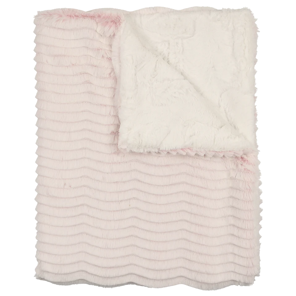 Pink textured blanket on a white background