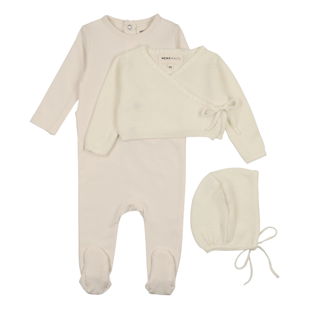 Baby outfit set with cream-colored cardigan, onesie, and bonnet on a white background