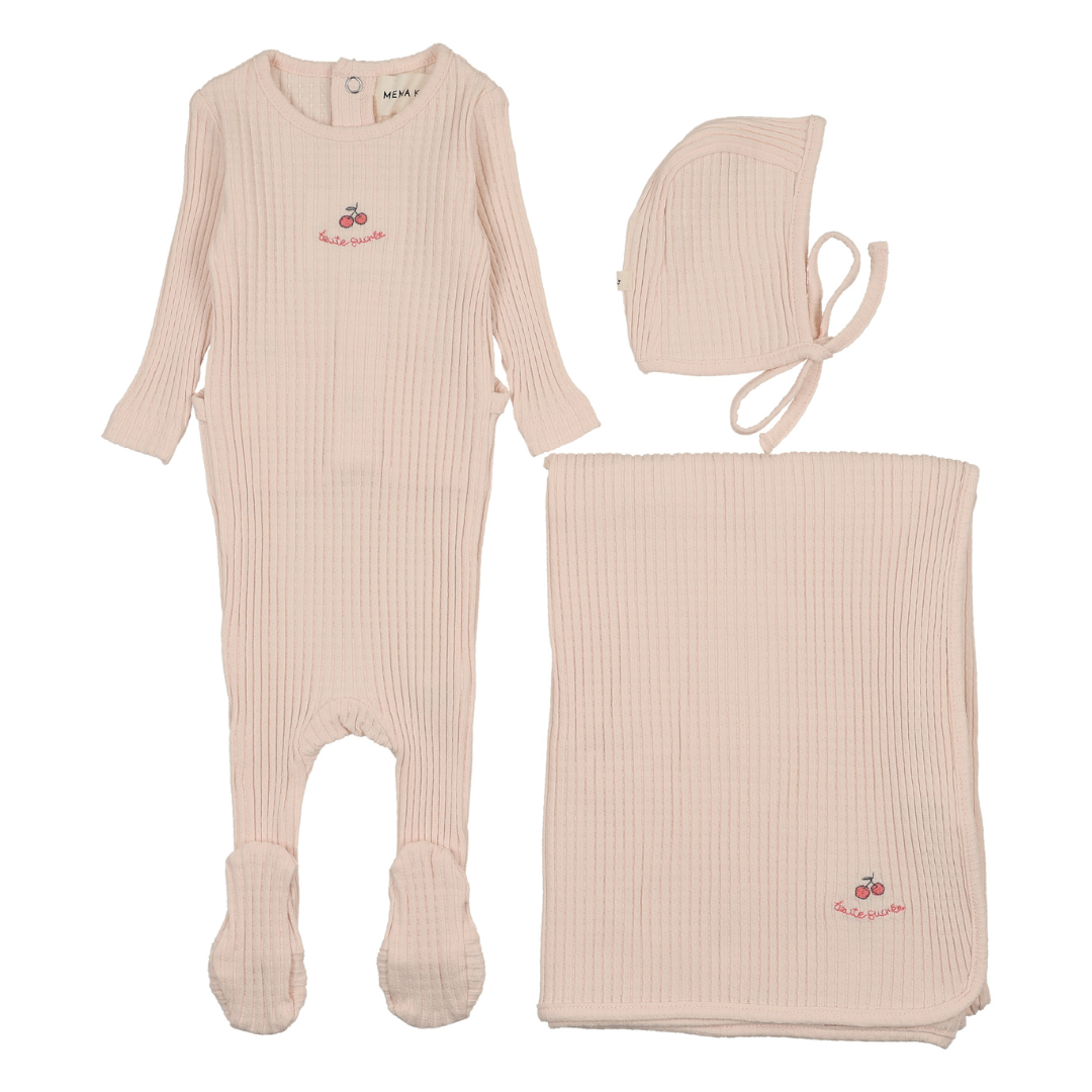 Baby outfit set with pink romper, bonnet, and blanket on a white background