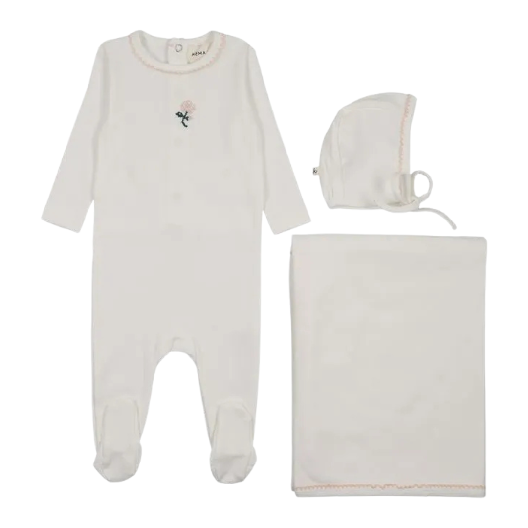 Baby outfit set with white onesie, bonnet, and blanket on a white background