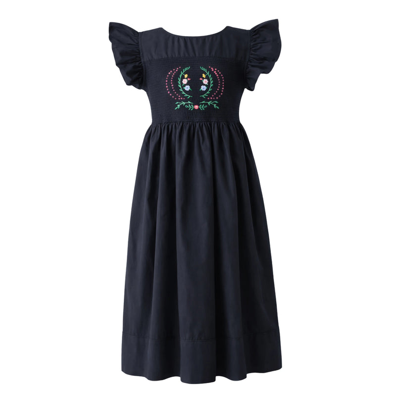 Black dress with floral embroidery on a white background