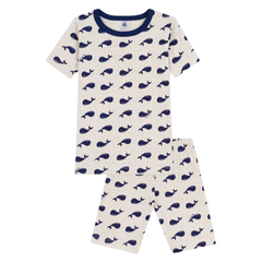 Children's pajama set with whale pattern on a white background