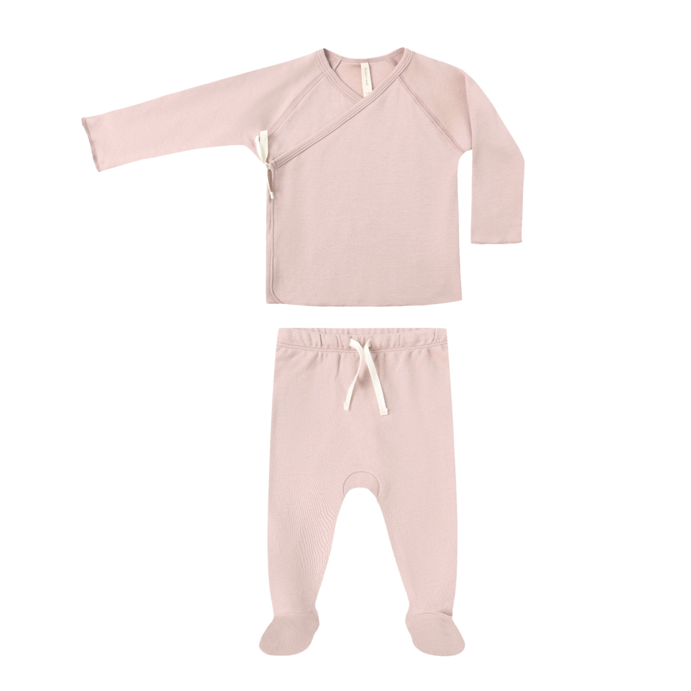 Pink baby outfit with top and pants on a white background