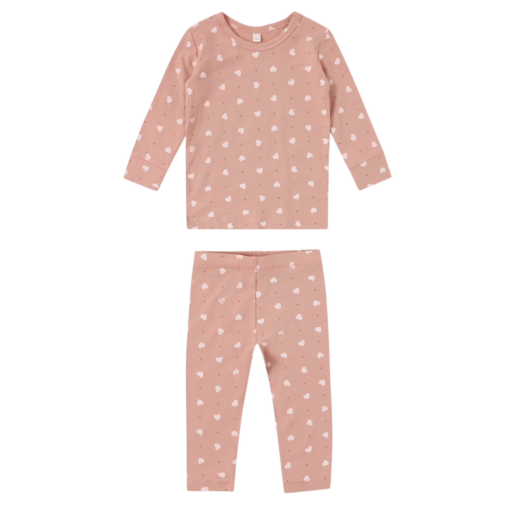 Pink children's pajama set with white heart patterns on a white background