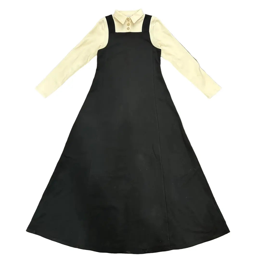 Black apron over a yellow shirt on a white background