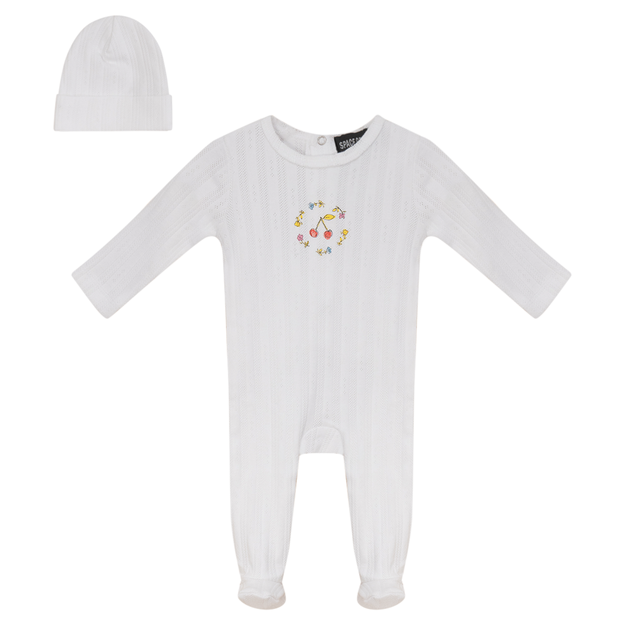 White baby onesie with colorful design and matching hat on a white background