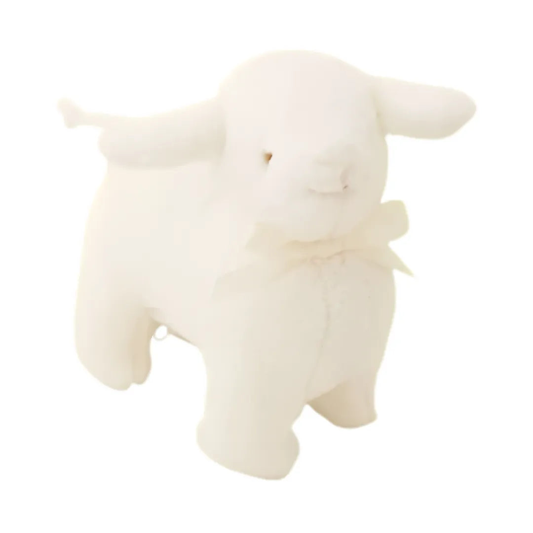 A flat-lay view of the Alimrose Lamby musical toy in cream.