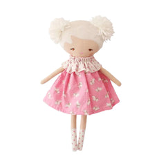 A front view of the Alimrose Layla doll wearing the playful Pink Puppies print outfit.