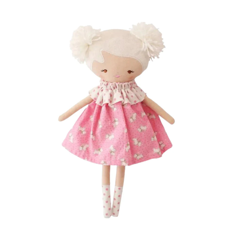 A front view of the Alimrose Layla doll wearing the playful Pink Puppies print outfit.