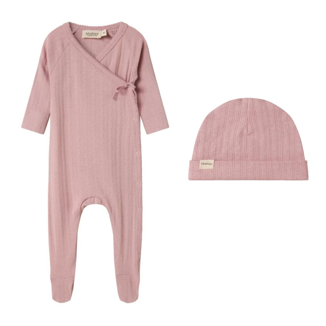 A breathtaking MarMar Copenhagen Soft Berry Footie and Hat Set, showcasing its authoritative architectural fit and refined, butter-soft modal texture.