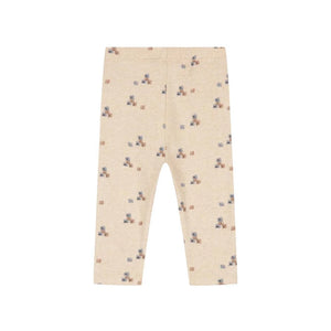 Beige baby leggings with a small teddy bear and block print pattern, shown flat against a white background.