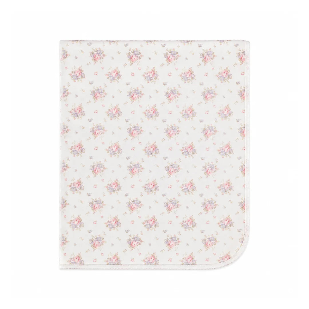 A neatly folded presentation showcasing the floral knit pattern and texture.