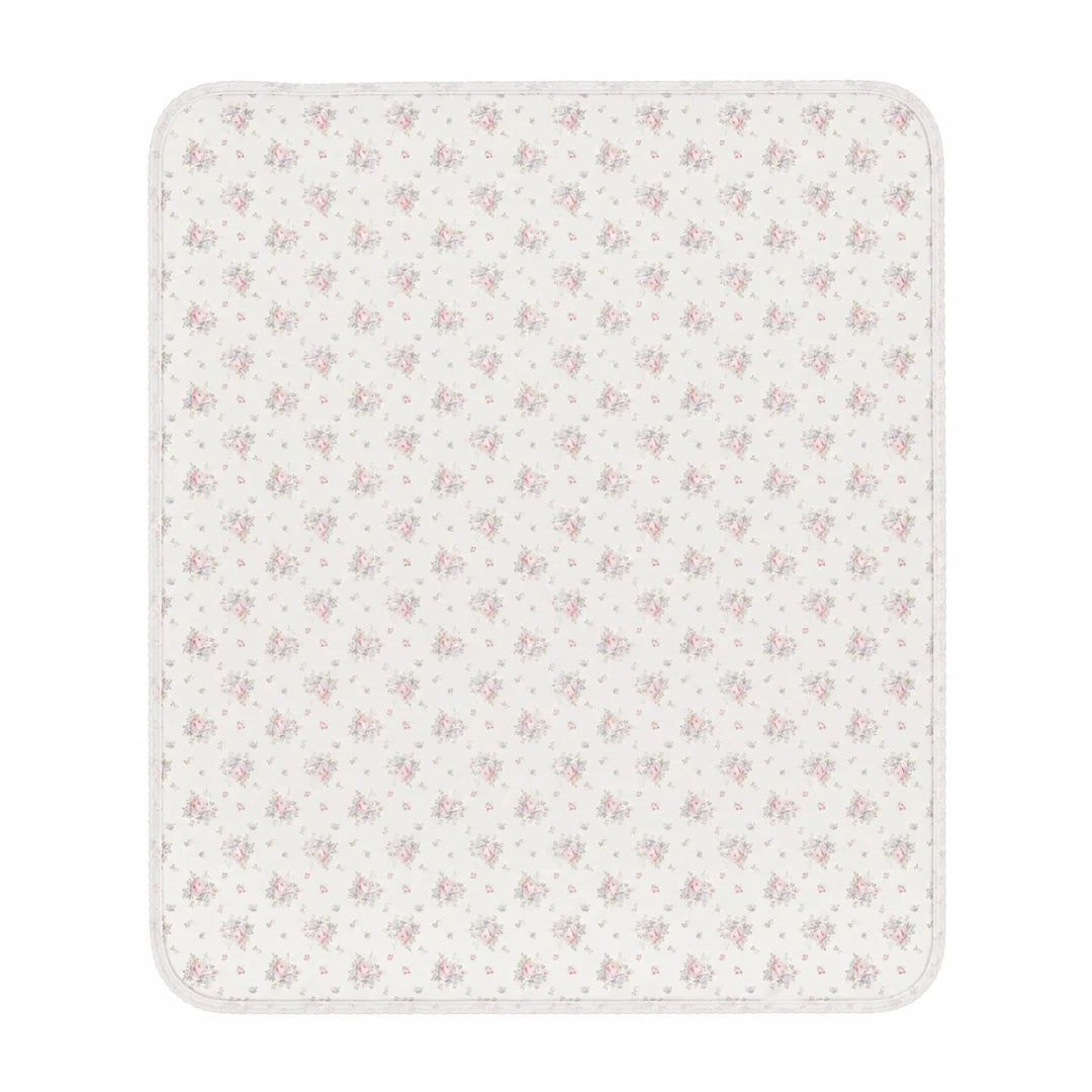 A front view of the Bebe Organic Amora Blooms organic cotton baby blanket.