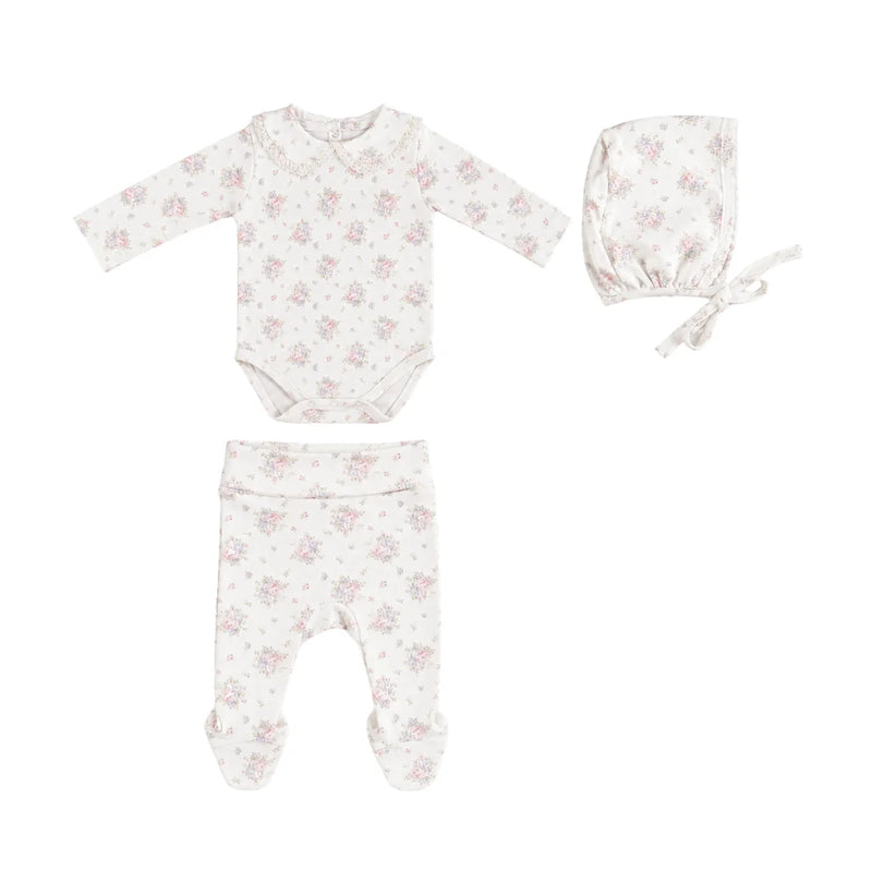 A front view of the Bebe Organic Amora Blooms newborn onesie, legging, and bonnet set.