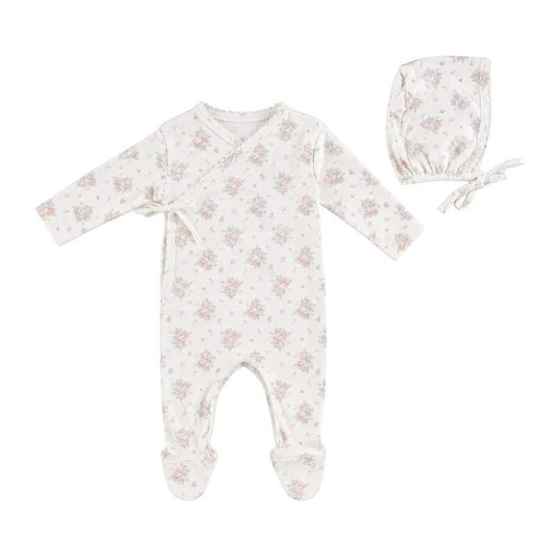 A front view of the Bebe Organic Amora Blooms newborn wrap footie and bonnet set.