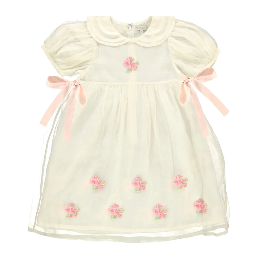 A front view of the Bebe Organic Fairy dress in a soft rose color.