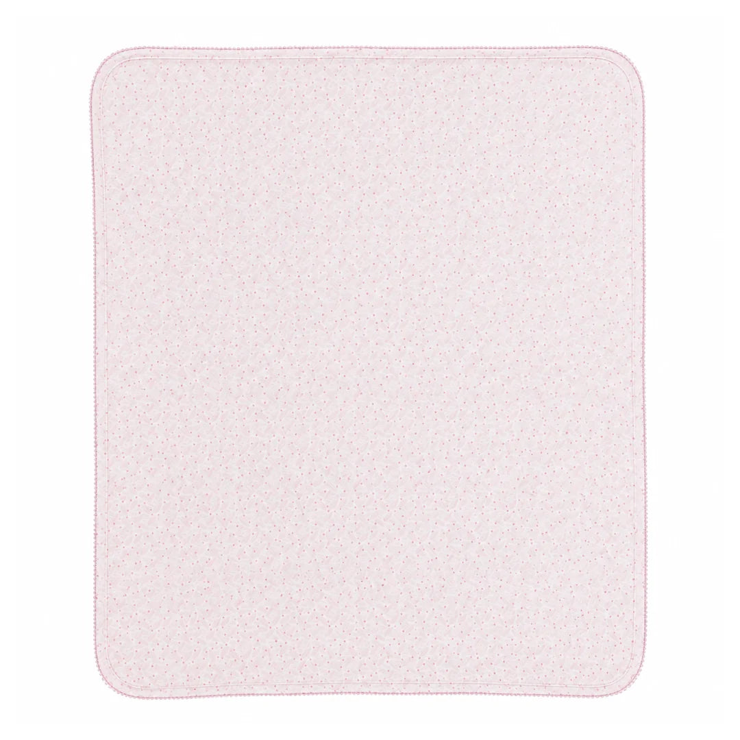A front view of the Bebe Organic Idra pink leaves organic cotton baby blanket.