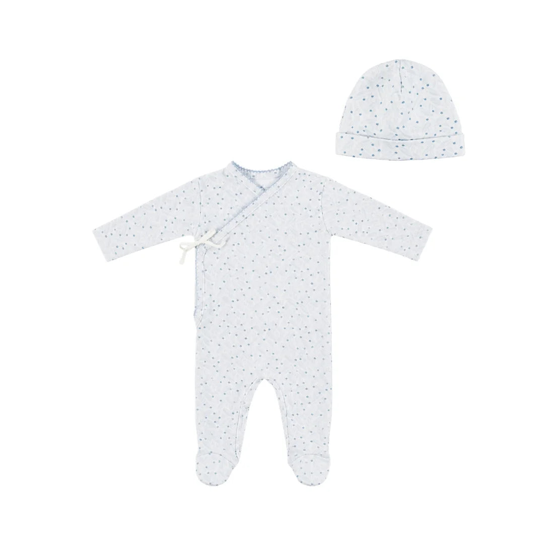 A front view of the Bebe Organic Iver blue leaves newborn wrap footie and hat set.