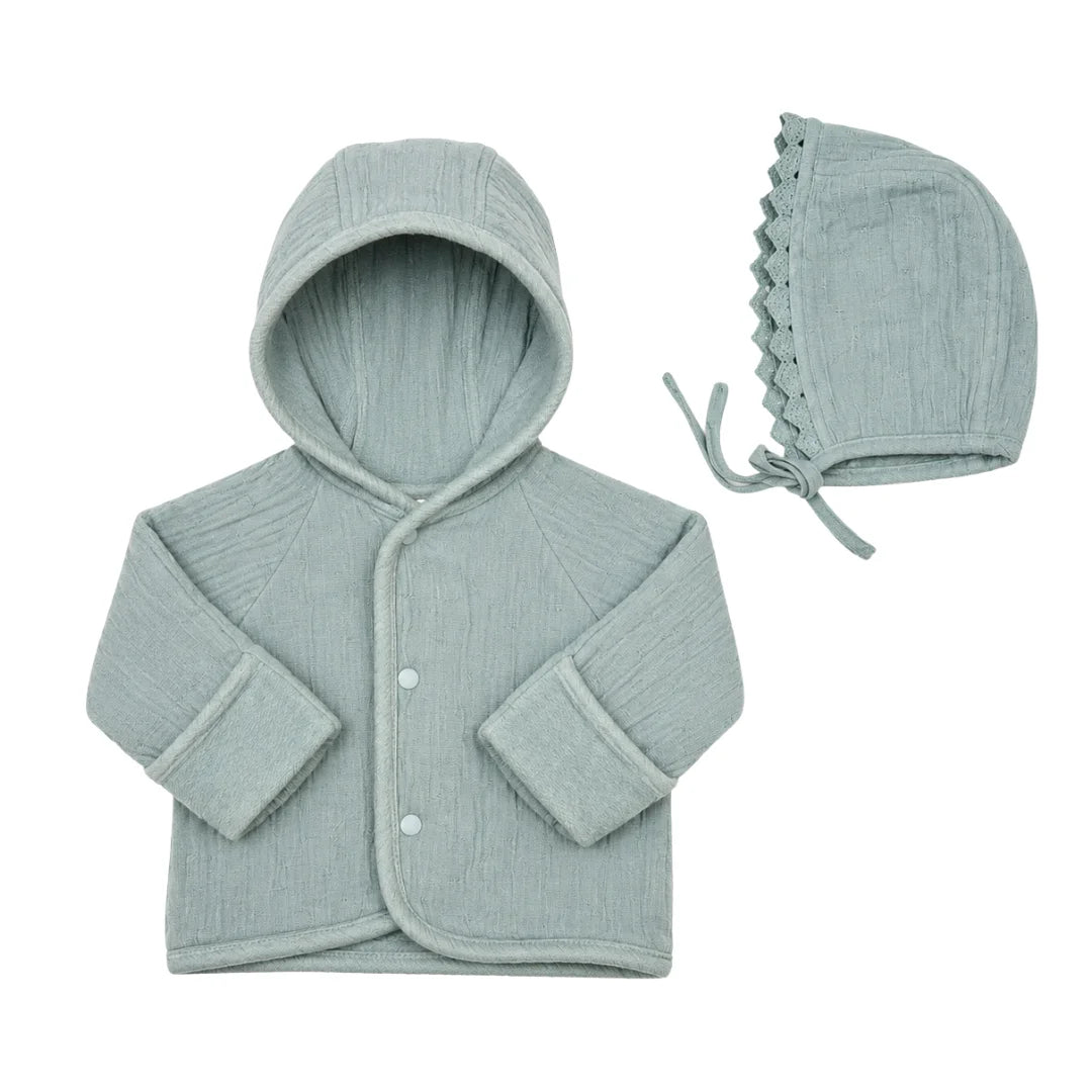 front view of the Bebe Organic atlantic blue chenille baby jacket and matching bonnet.