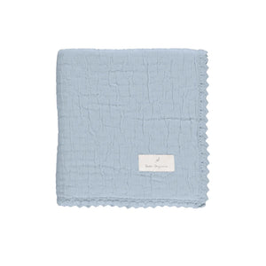 A neatly folded presentation showcasing the plush chenille texture.