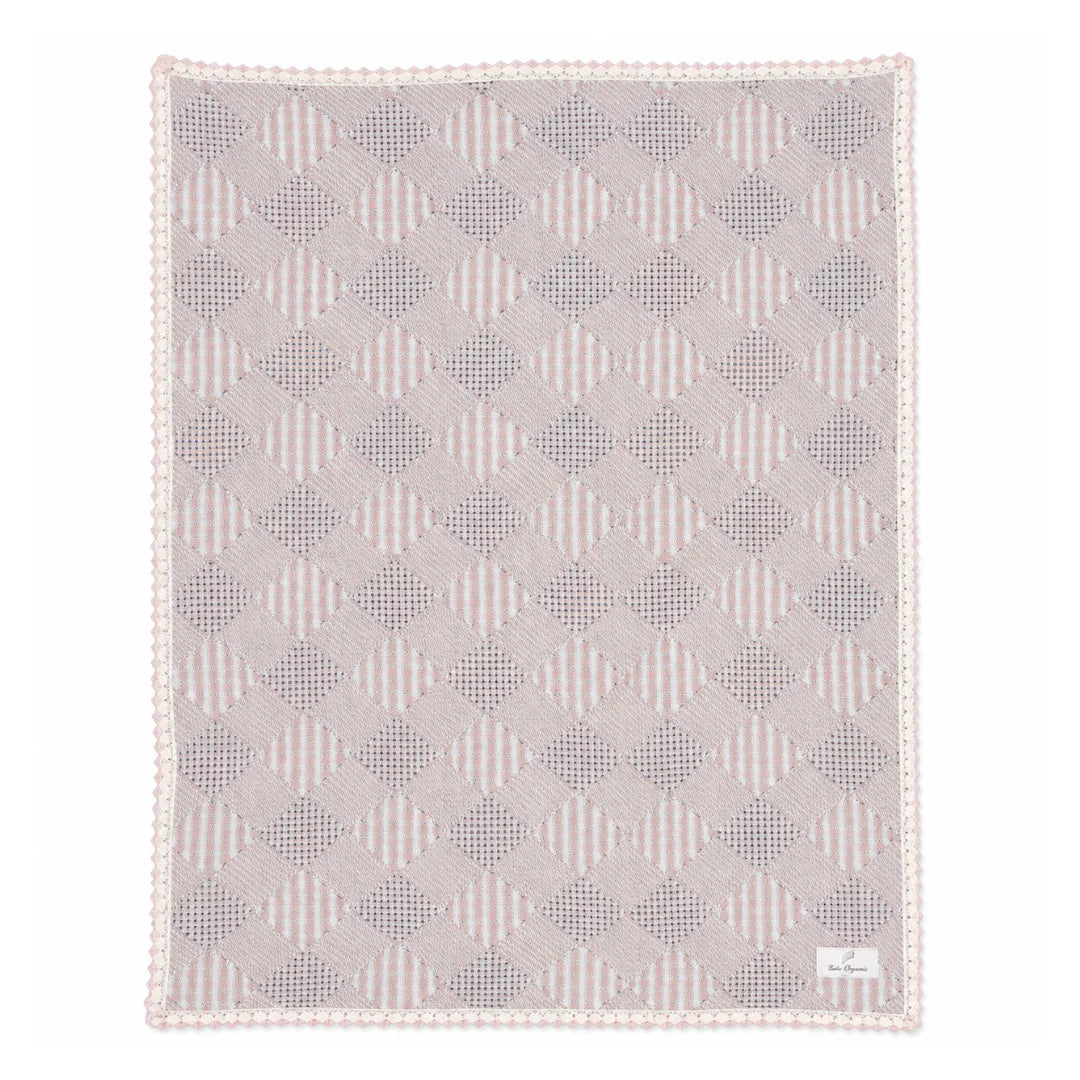 A front view of the Bebe Organic pink plaid patchwork organic cotton baby blanket.