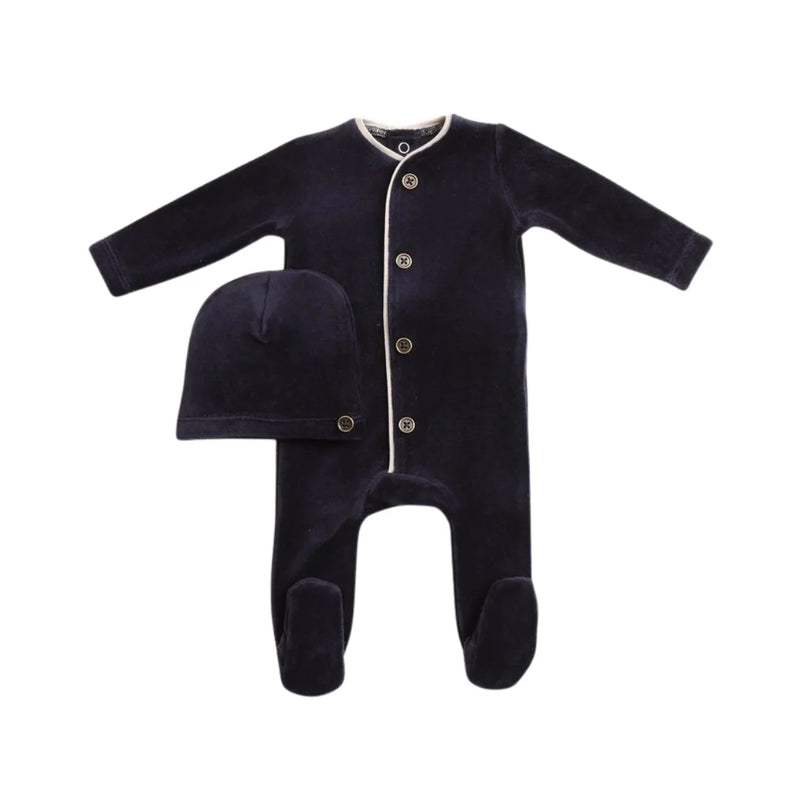 A front view of the luxurious captain blue Bee & Dee velour footie and beanie set.