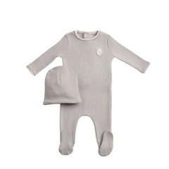 A front view of the elegant chateau stone Bee & Dee cutout footie and beanie set.