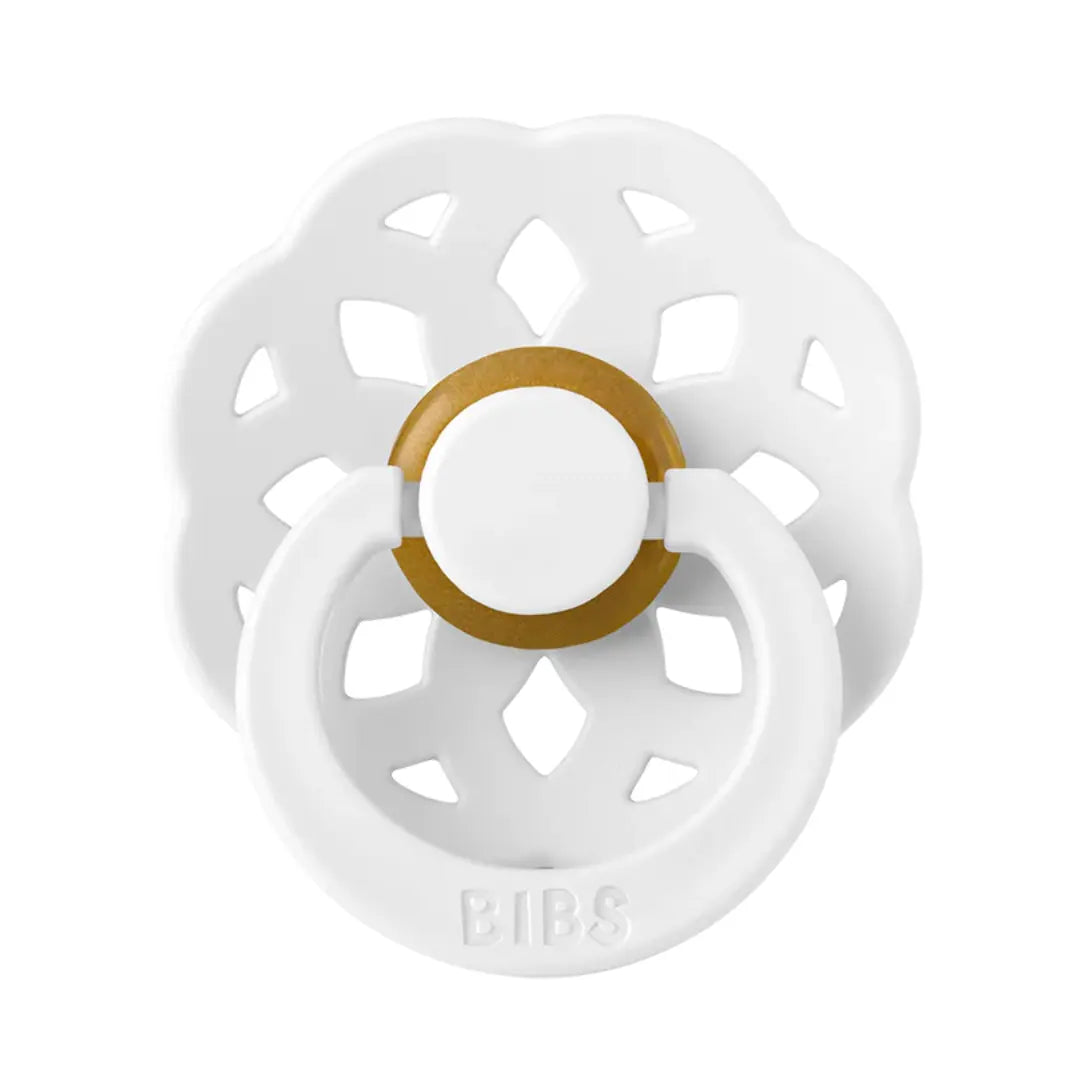 White and gold pacifier with 'BIBS' branding on a white background