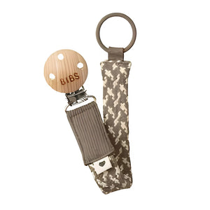 BIBS pacifier clip with camouflage strap on a white background