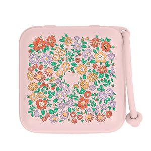 Small pink pouch with floral pattern on a white background