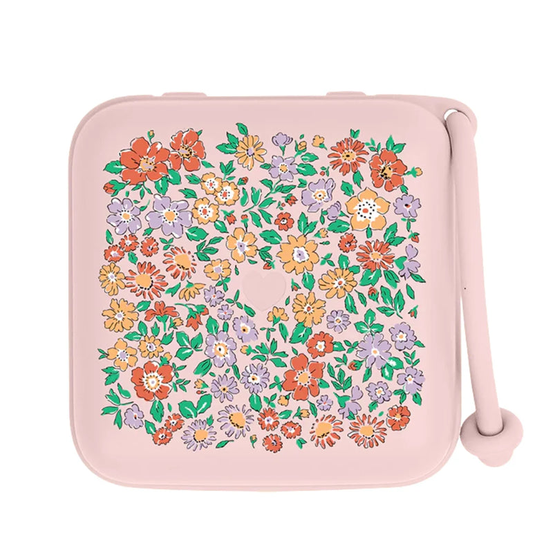Small pink pouch with floral pattern on a white background