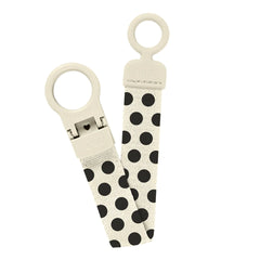 A breathtaking BIBS Studio Loop Pacifier Clip in Polka Ivory and Black, showcasing its immaculate minimalist design and secure attachment loop.