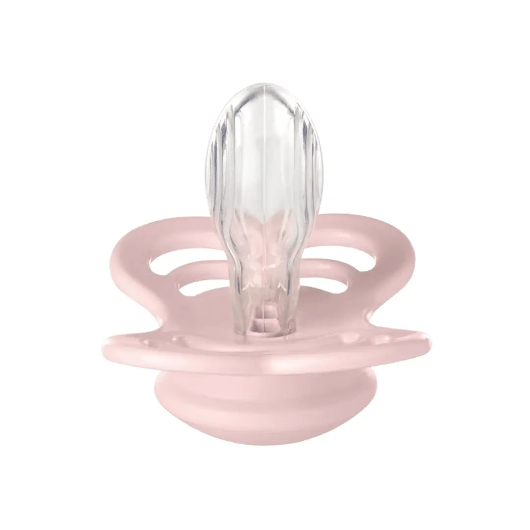 Pink baby pacifier with clear silicone tip on a white background