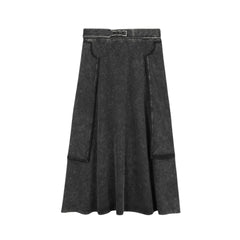 A front view of the Byke black wash patch knit midi skirt.