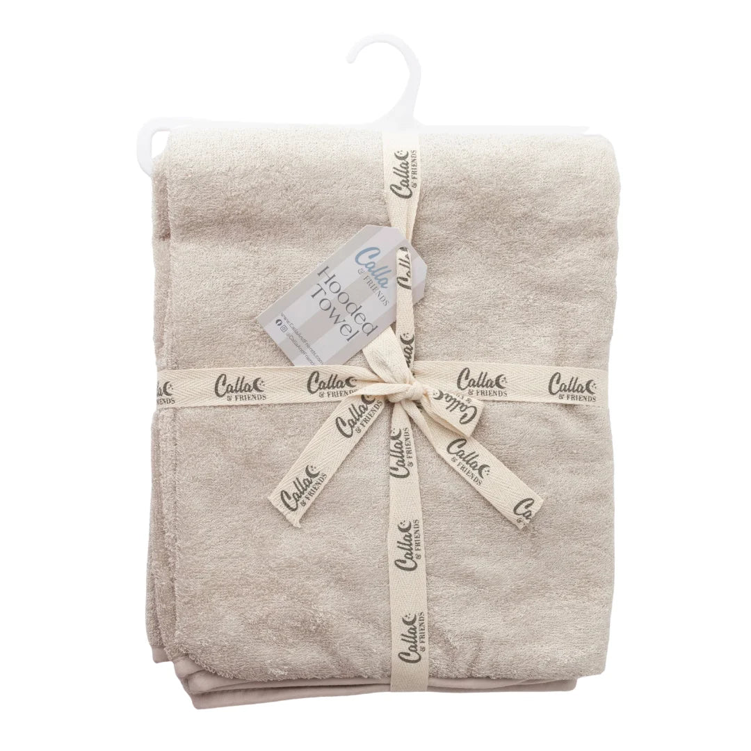 Folded beige towel with 'Calla' branding on a white background