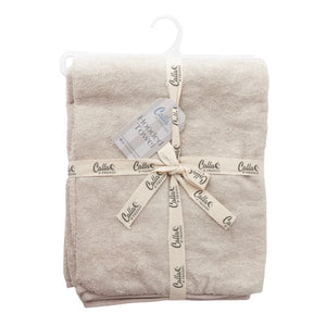 Folded beige towel with 'Calla' branding on a white background