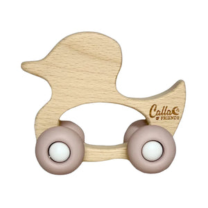 A breathtaking Calla & Friends rolling duck toy featuring an immaculate petal pink finish and smooth gliding wheels.