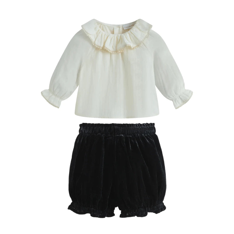 A breathtaking C'era Una Volta two-piece set featuring the delicate Cream Lilly shirt and Black Romeo bloomer.
