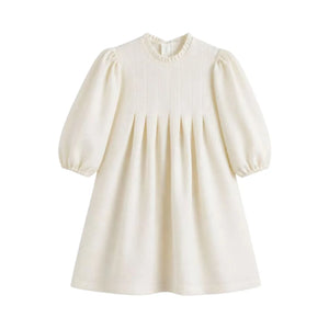 Front view of the elegant cream-colored C’era Una Volta Brigitte long-sleeve dress with a classic tailored silhouette