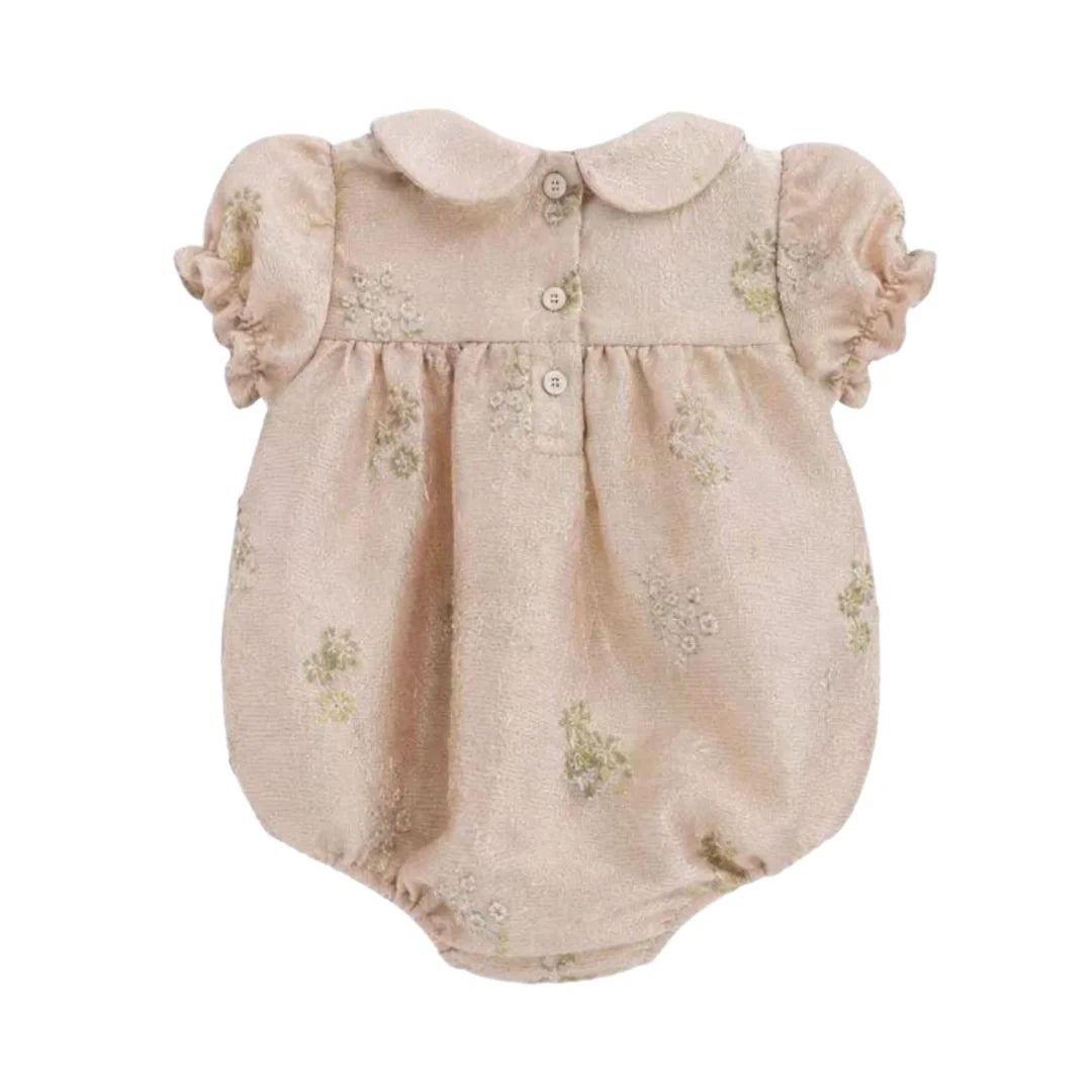 The clean back view of the C’era Una Volta Frankie romper.