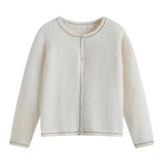 A breathtaking C'era Una Volta Gabriella Cardigan in Cream, showcasing an immaculate knit design and classic button-front silhouette.