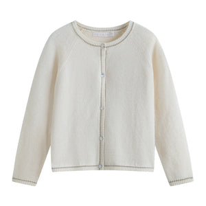 A breathtaking C'era Una Volta Gabriella Cardigan in Cream, showcasing an immaculate knit design and classic button-front silhouette.
