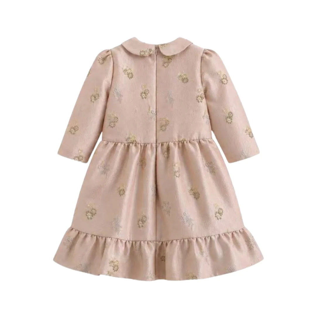 The clean back view of the C’era Una Volta Lylas long-sleeve dress.