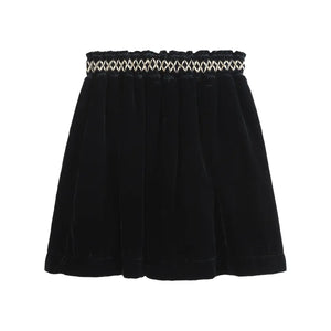 Black skirt with patterned waistband on a white background